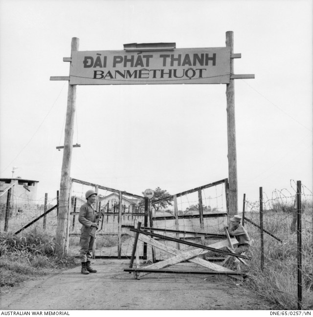 A sentry at the closed gates of a radio station
