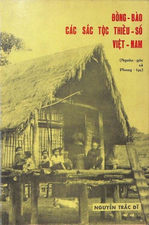 The cover of Đồng Bào Các Sắc Tộc Thiểu Số, with a photograph of a highland house on stilts and people on its platform, published by the ministry in 1972
