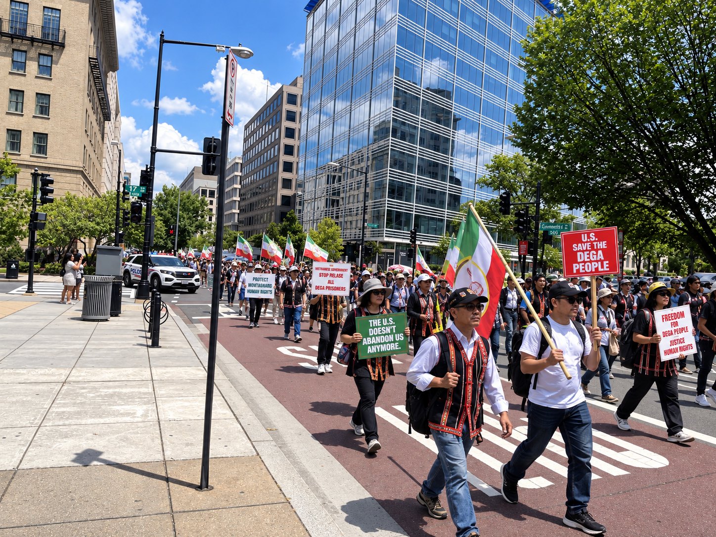 The march crossing a Washington street past glass office buildings