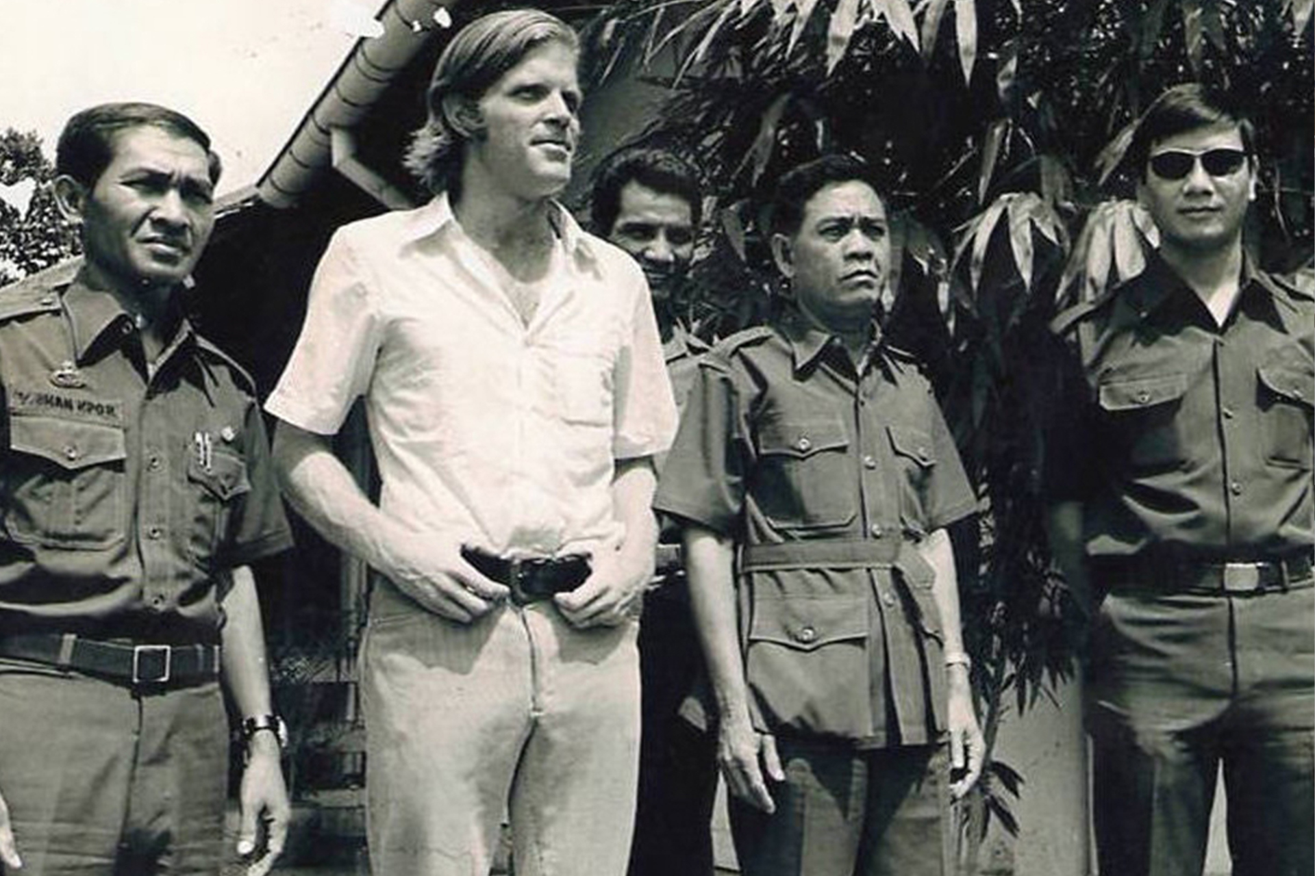 Y-Bham Enuol, president of the Dega people, with others