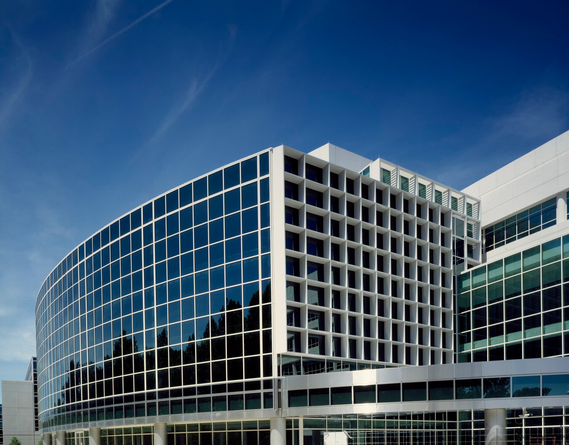 A modern glass and stone building, the National Archives at College Park, Maryland