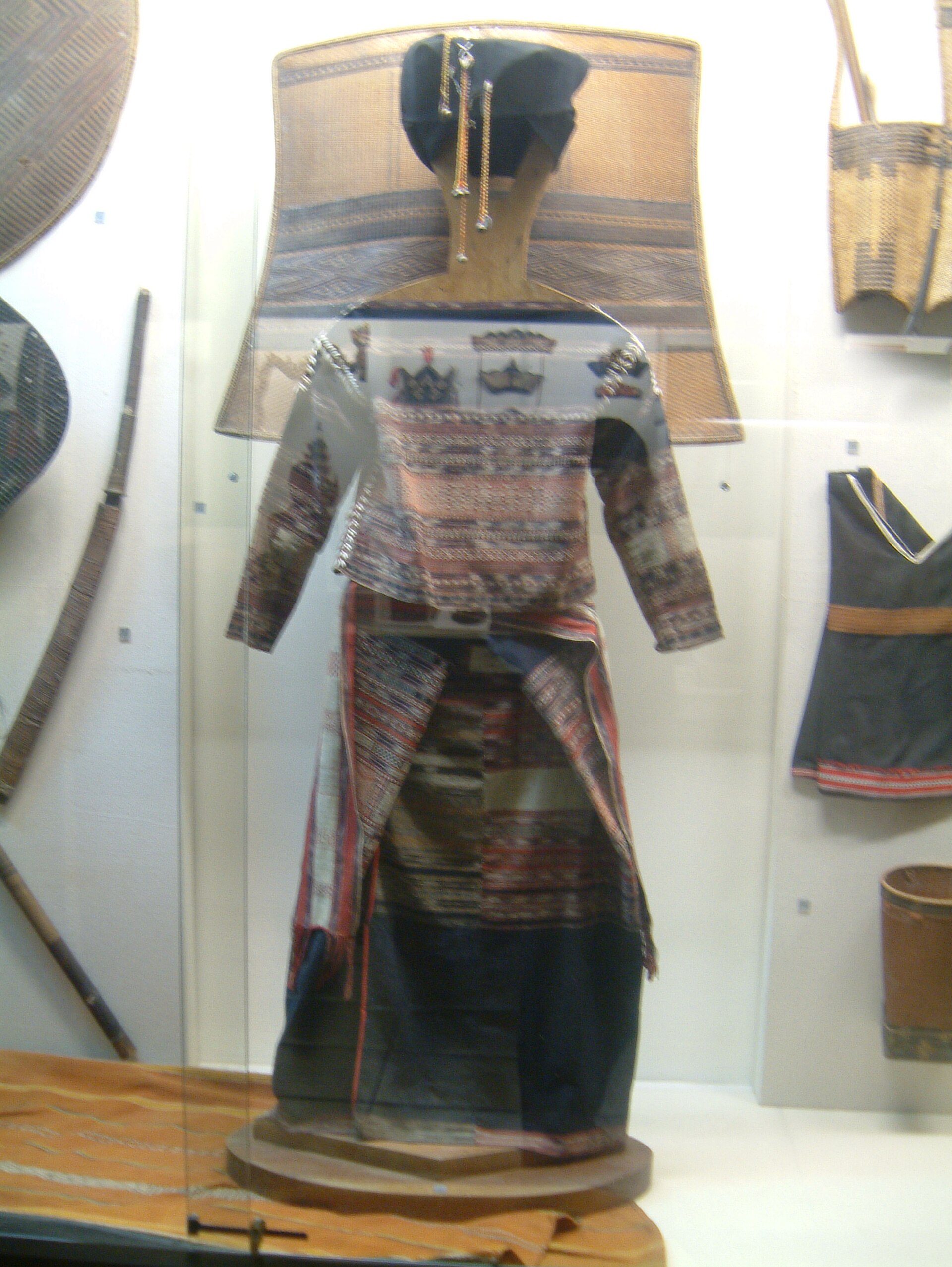 A Sedang costume displayed in a museum case